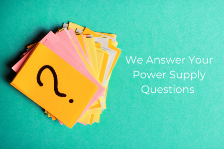 We Answer Your Power Supply Questions - a stack of colorful paper with a question mark on top